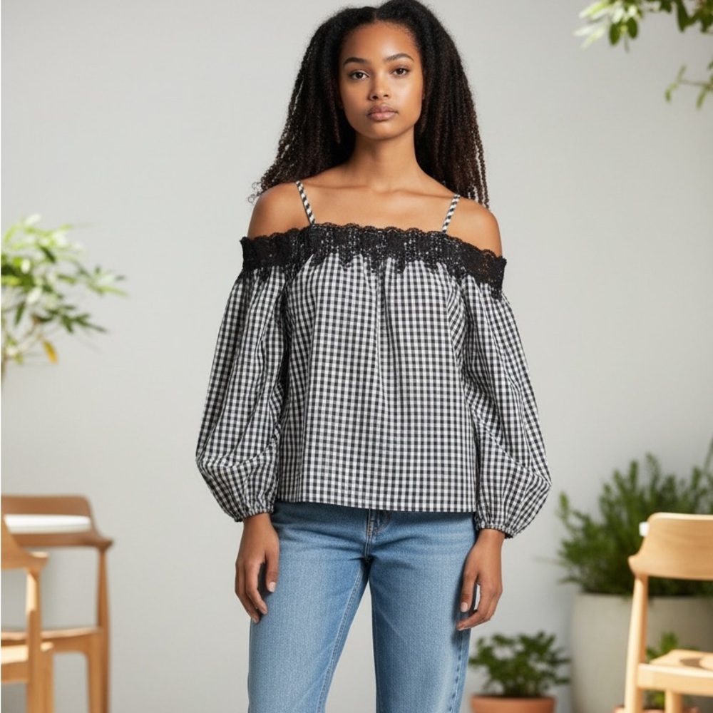 Romeo & Juliet Couture off the shoulder blouse.